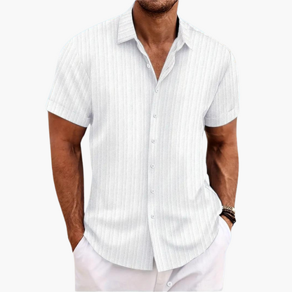 Sleek men's shirt featuring a stylish striped pattern and a classic button-up design, perfect for formal or casual occasions. 7