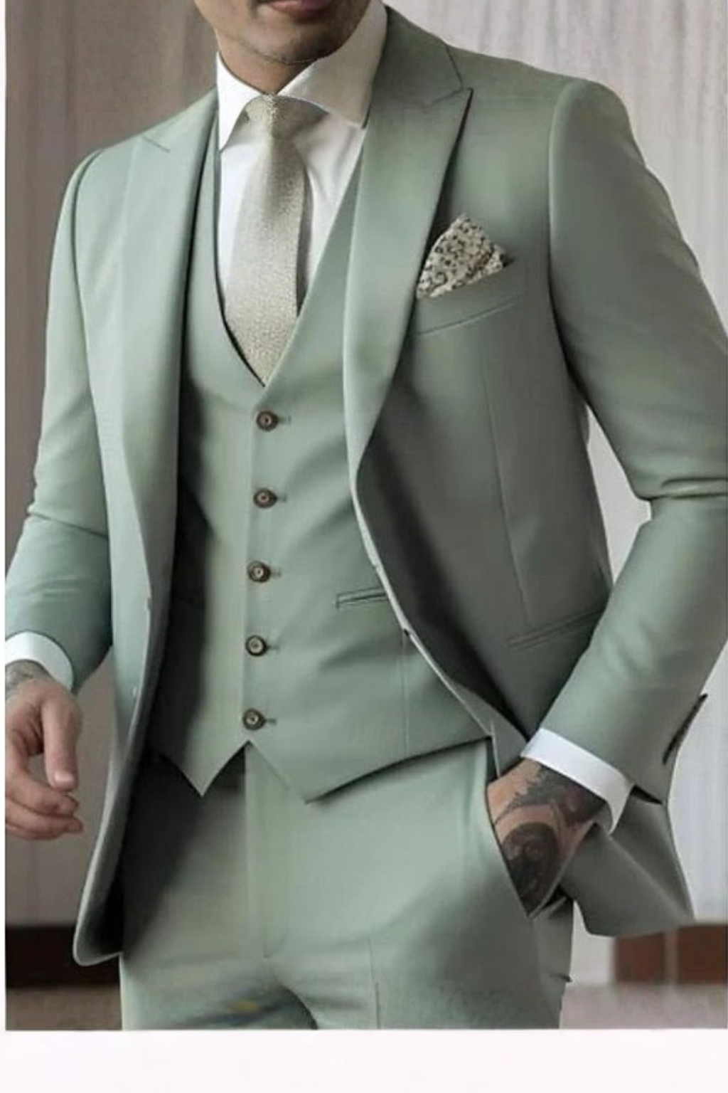 Sleek men’s three-piece suit featuring a slim fit design and stylish peak lapel, perfect for formal occasions and business events. 2