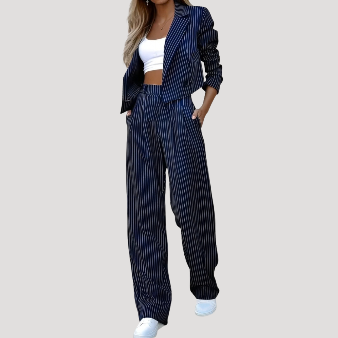 Sleek suit set for women featuring a stylish cropped blazer and wide-leg trousers, designed for a modern and sophisticated look. 1