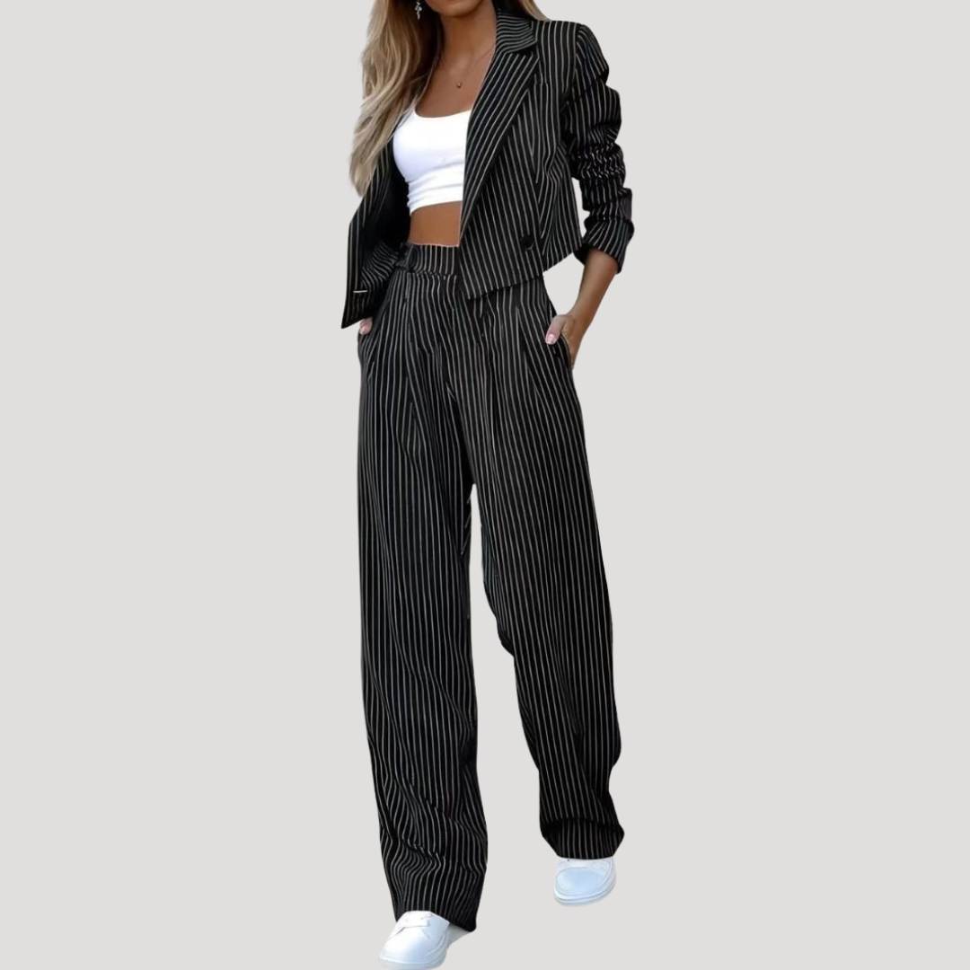 Sleek suit set for women featuring a stylish cropped blazer and wide-leg trousers, designed for a modern and sophisticated look. 2