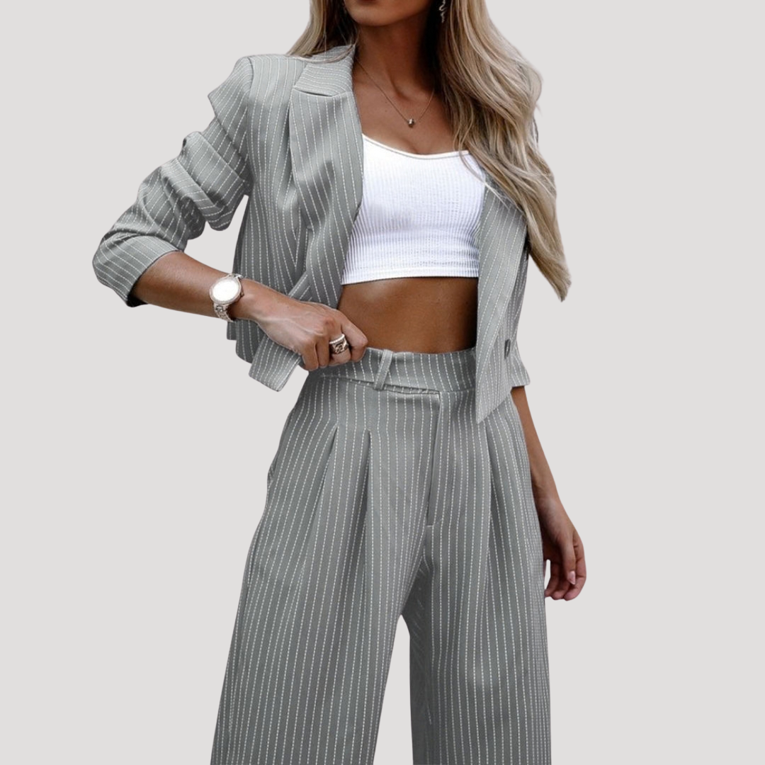 Sleek suit set for women featuring a stylish cropped blazer and wide-leg trousers, designed for a modern and sophisticated look. 3