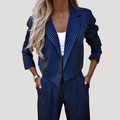 Sleek suit set for women featuring a stylish cropped blazer and wide-leg trousers, designed for a modern and sophisticated look. 5