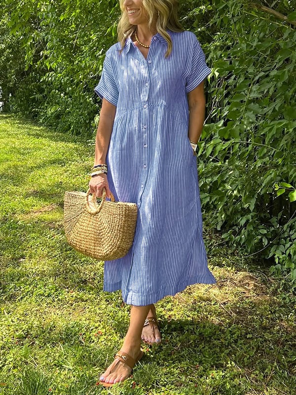 Sleek women’s dress featuring a stylish button-up front and a chic vertical stripe design, perfect for both casual and formal occasions. 0