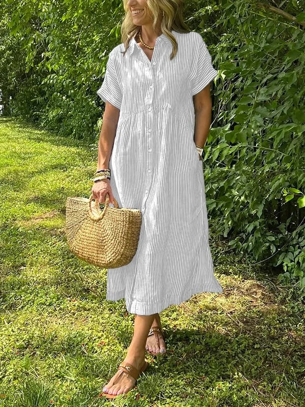 Sleek women’s dress featuring a stylish button-up front and a chic vertical stripe design, perfect for both casual and formal occasions. 1