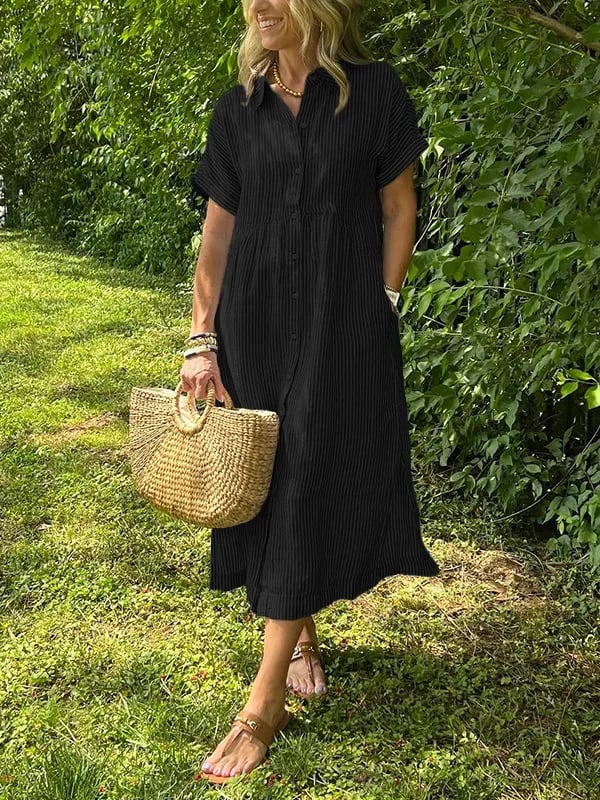 Sleek women’s dress featuring a stylish button-up front and a chic vertical stripe design, perfect for both casual and formal occasions. 2