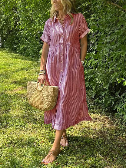 Sleek women’s dress featuring a stylish button-up front and a chic vertical stripe design, perfect for both casual and formal occasions. 3