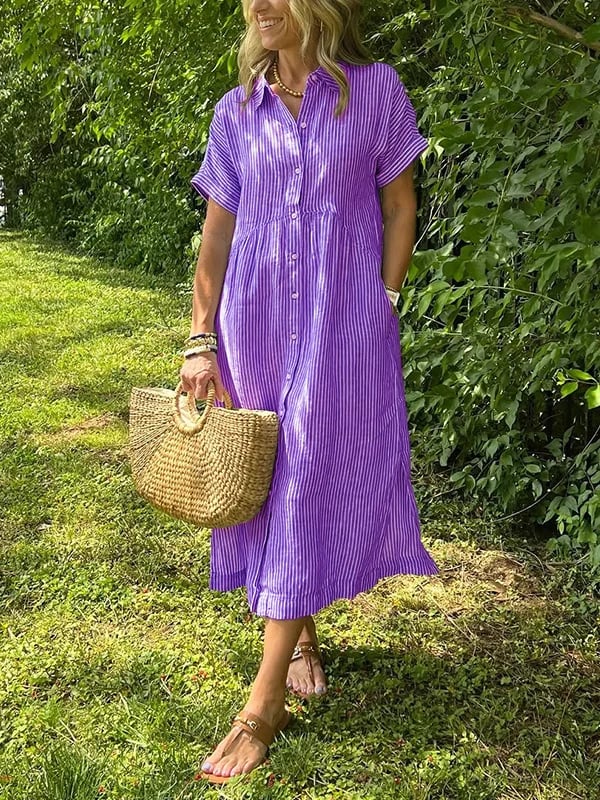 Sleek women’s dress featuring a stylish button-up front and a chic vertical stripe design, perfect for both casual and formal occasions. 6