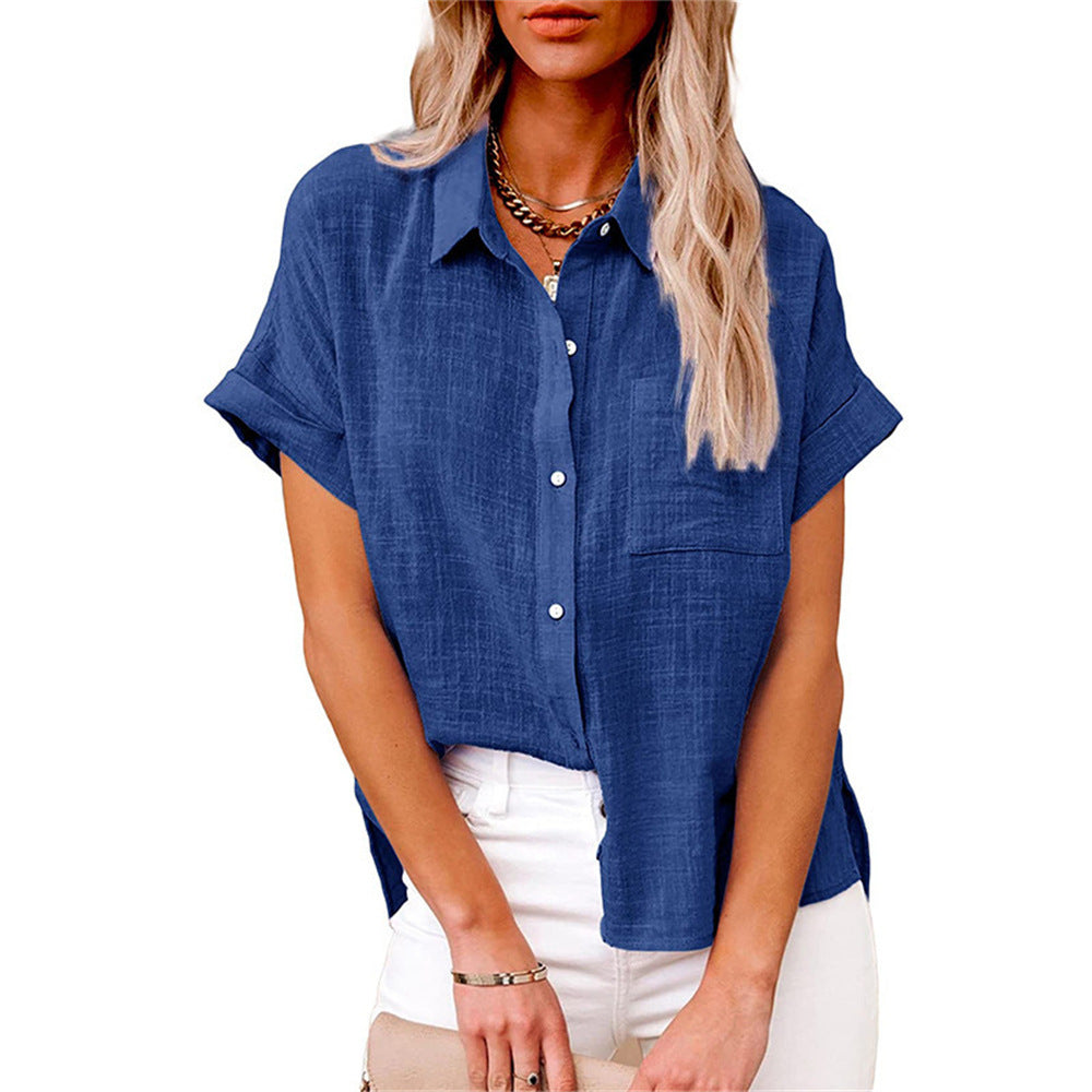 Sleek women's shirt featuring a stylish collared neckline and a practical front pocket, perfect for both casual and professional looks. 2