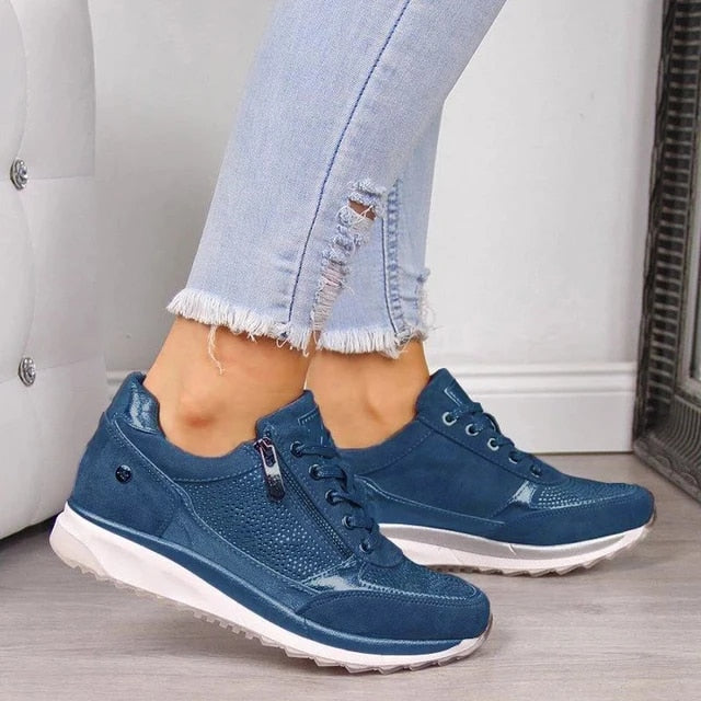 Sleek women's sneakers featuring a lace-up and zipper design for ultimate comfort and style, perfect for casual outings and active lifestyles. 2