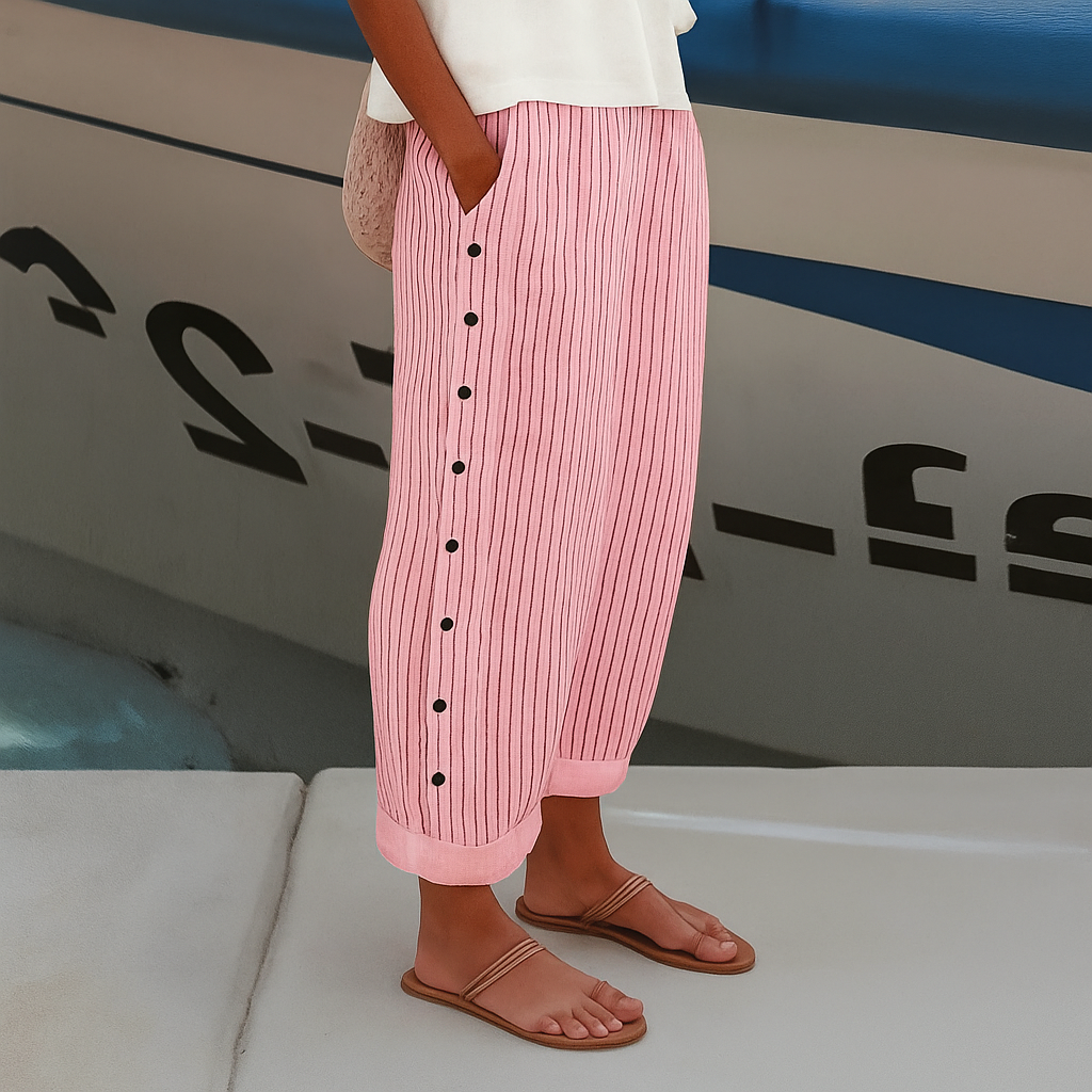 Sleek women’s trousers featuring stylish stripe panel detail and a chic cropped length, perfect for modern casual or office wear. 3