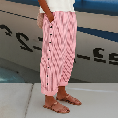 Sleek women’s trousers featuring stylish stripe panel detail and a chic cropped length, perfect for modern casual or office wear. 3