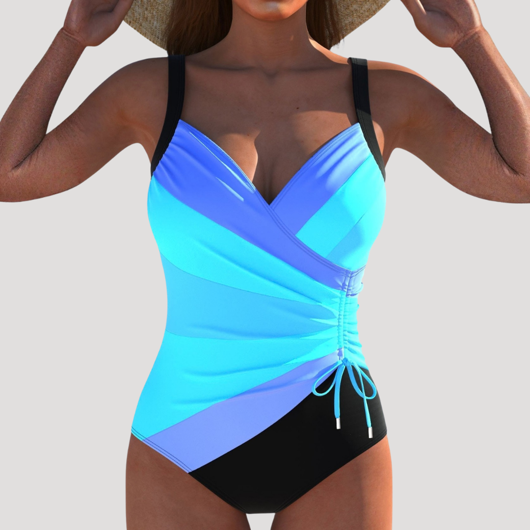 Soleil Women’s One-Piece Swimsuit featuring a wrap front bodice design and vibrant multicolor print, perfect for beach outings and summer 1