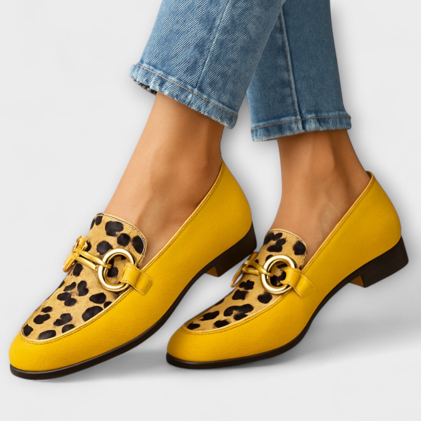 Sonia Women’s Slip-On Loafers featuring a stylish metallic buckle and modern square toe design, perfect for casual and professional settings. 0