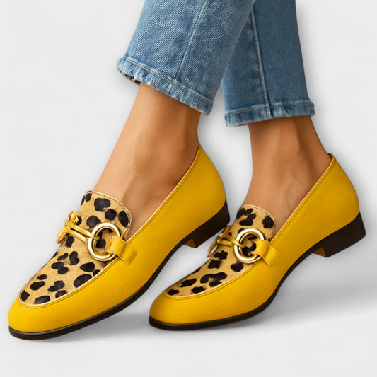 Sonia Women’s Slip-On Loafers featuring a stylish metallic buckle and modern square toe design, perfect for casual and professional settings. 0