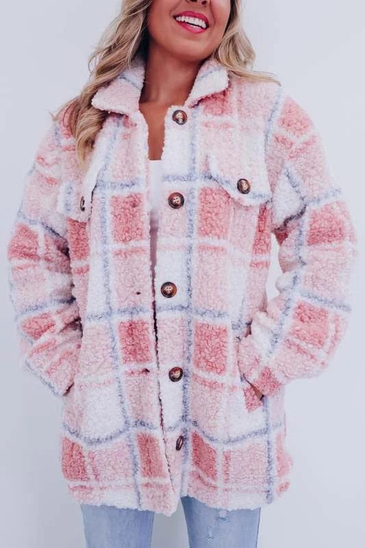 Stella Women’s Wool Coat featuring a classic silhouette, elegant design, and functional pockets, perfect for stylish winter warmth. 0