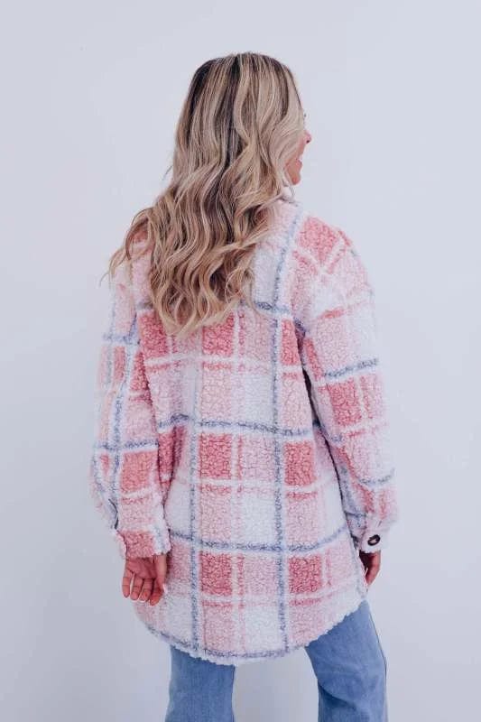 Stella Women’s Wool Coat featuring a classic silhouette, elegant design, and functional pockets, perfect for stylish winter warmth. 3