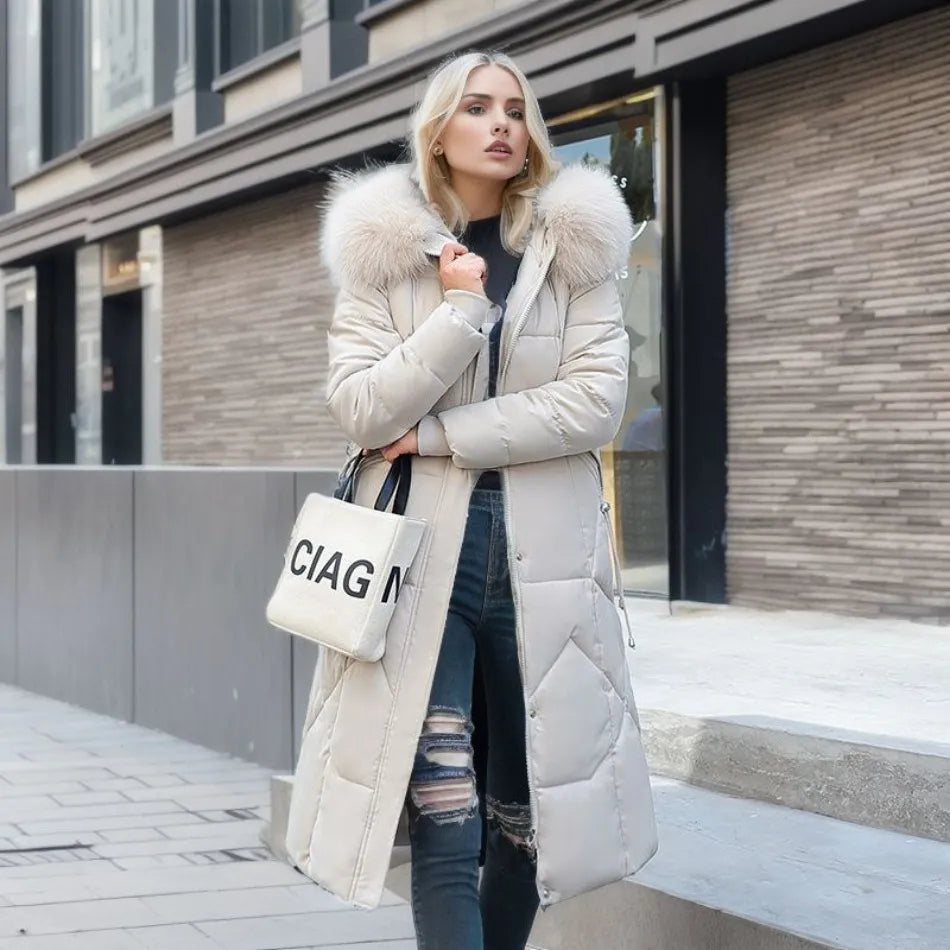 Tahlia Women’s Winter Coat featuring an adjustable hood and deep pockets, designed for ultimate warmth and comfort during cold weather. 0
