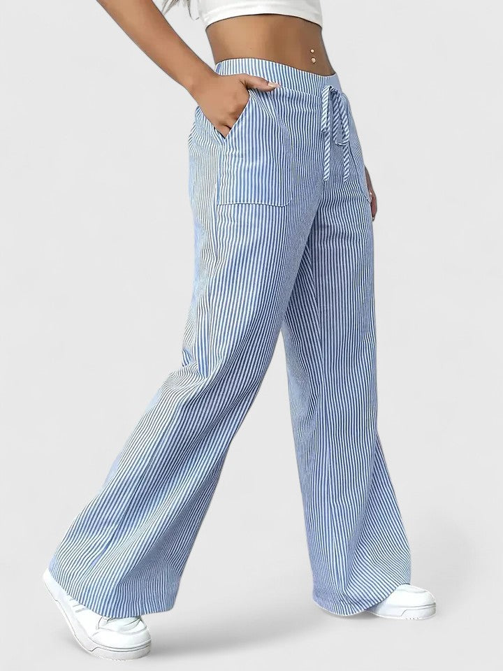 Talia Women’s Trousers featuring an adjustable waist and stylish wide-leg design for comfort and versatility. 1