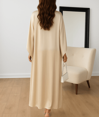 Tara Maxi Abaya featuring elegant draped cape sleeves in a luxurious rich plum color, perfect for stylish modest wear. 1