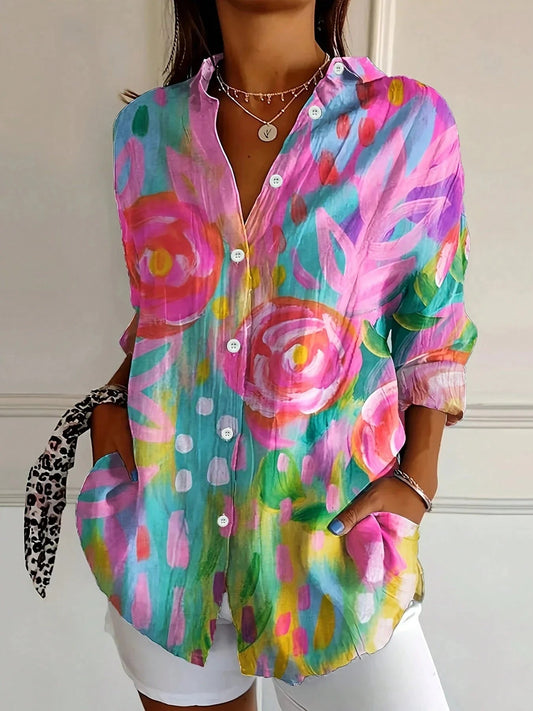 Tara Women’s Blouse featuring a vibrant colorful print and lightweight airy fit, perfect for stylish summer wear. 0