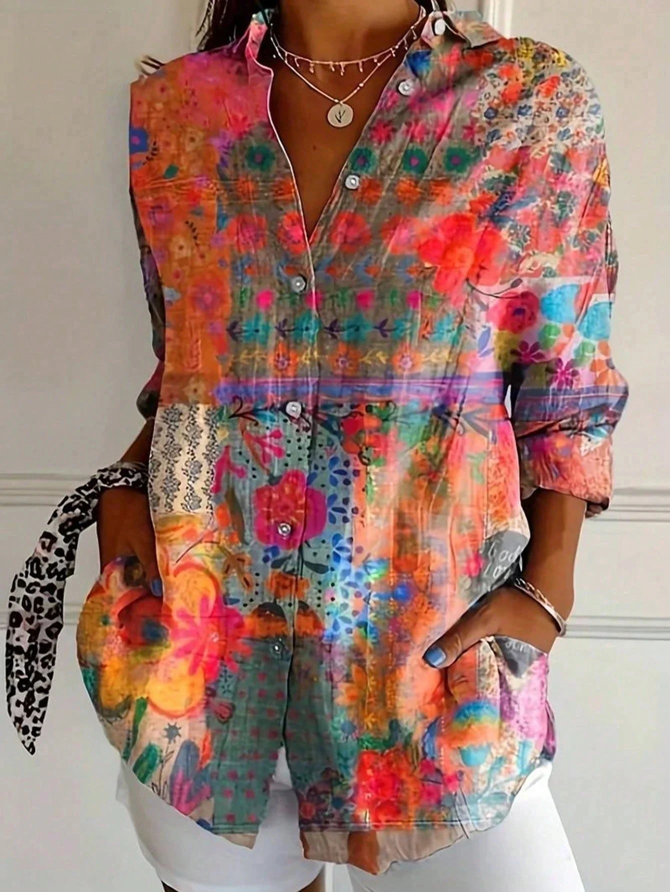 Tara Women’s Blouse featuring a vibrant colorful print and lightweight airy fit, perfect for stylish summer wear. 1