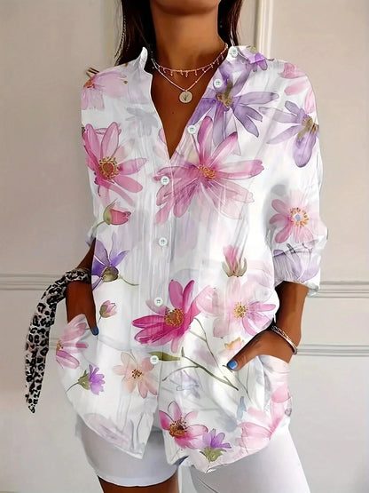 Tara Women’s Blouse featuring a vibrant colorful print and lightweight airy fit, perfect for stylish summer wear. 3