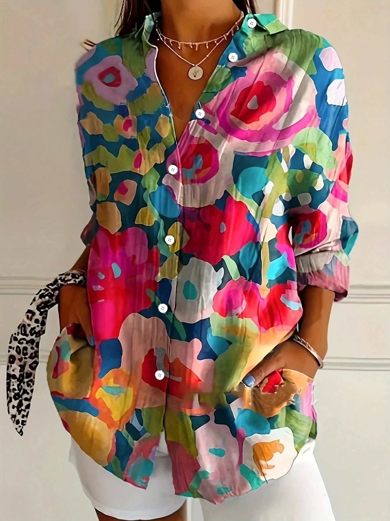 Tara Women’s Blouse featuring a vibrant colorful print and lightweight airy fit, perfect for stylish summer wear. 4