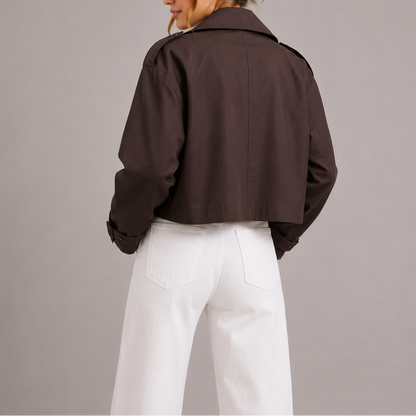 Tressa Women's Trench Coat featuring a stylish cropped fit and oversized lapels, ideal for chic layering and fashionable outerwear. 1