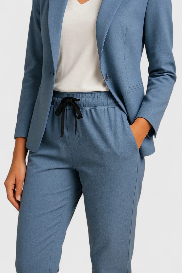 Elegant Trisha women's suit featuring a tailored jacket and matching pants, perfect for professional and formal occasions. 3