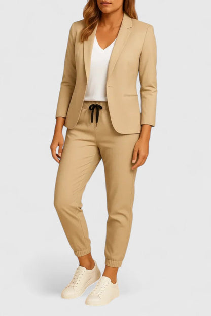 Elegant Trisha women's suit featuring a tailored jacket and matching pants, perfect for professional and formal occasions. 5