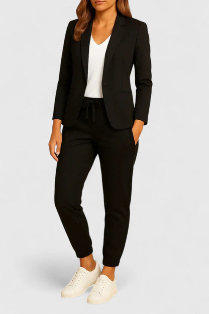 Elegant Trisha women's suit featuring a tailored jacket and matching pants, perfect for professional and formal occasions. 6