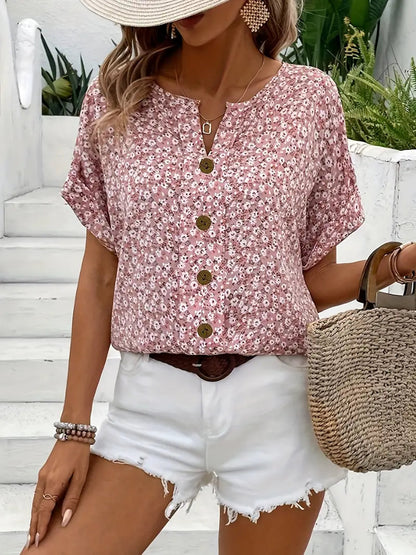 Vera Women’s Blouse featuring a vibrant floral print and stylish button-up design, perfect for casual or formal occasions. 0