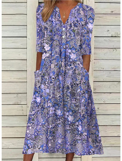 Vera Women’s Midi Dress featuring a stylish V-neck, 3/4 sleeves, and convenient side pockets, perfect for casual or semi-formal 1