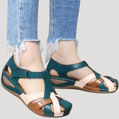 Vera Women’s Walking Sandals featuring a stylish woven strap design, perfect for comfort and support during outdoor activities. 1