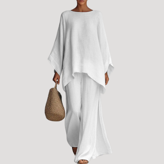 Wavy women’s co-ord set featuring a stylish relaxed cape style top and wide leg trousers, perfect for casual outings and comfortable wear. 0
