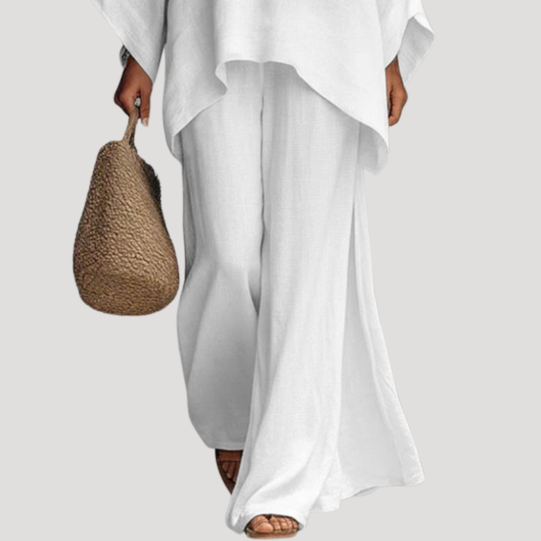 Wavy women’s co-ord set featuring a stylish relaxed cape style top and wide leg trousers, perfect for casual outings and comfortable wear. 2