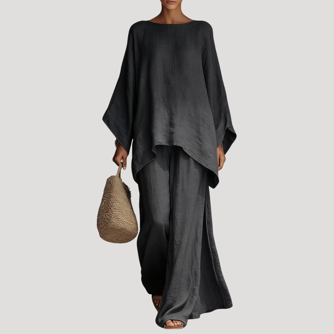 Wavy women’s co-ord set featuring a stylish relaxed cape style top and wide leg trousers, perfect for casual outings and comfortable wear. 3