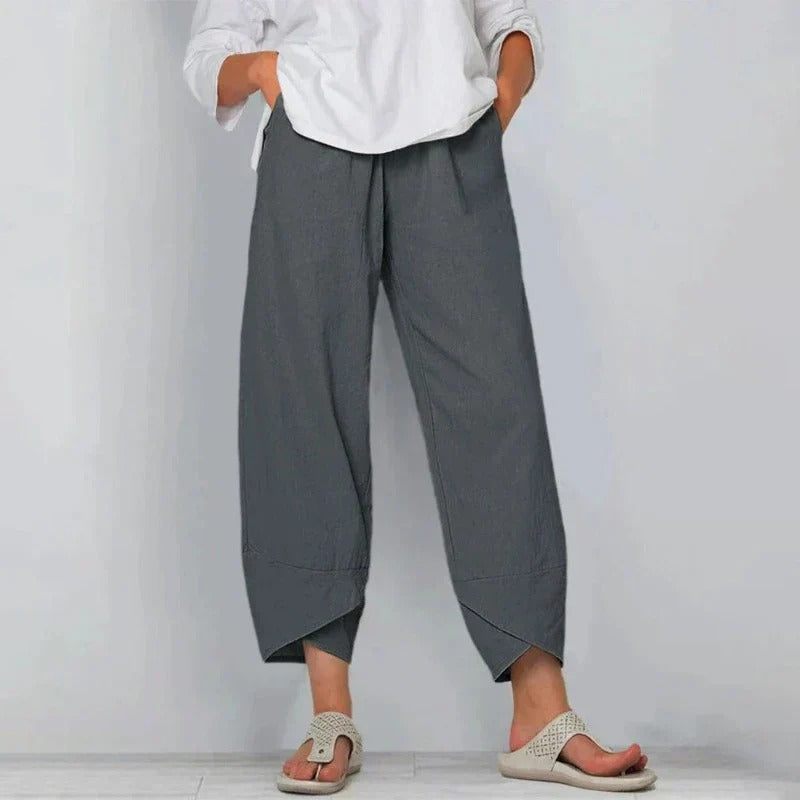 Wavy women’s pants featuring a wide leg cut and stylish angled hem detail, perfect for a chic and comfortable look. 4