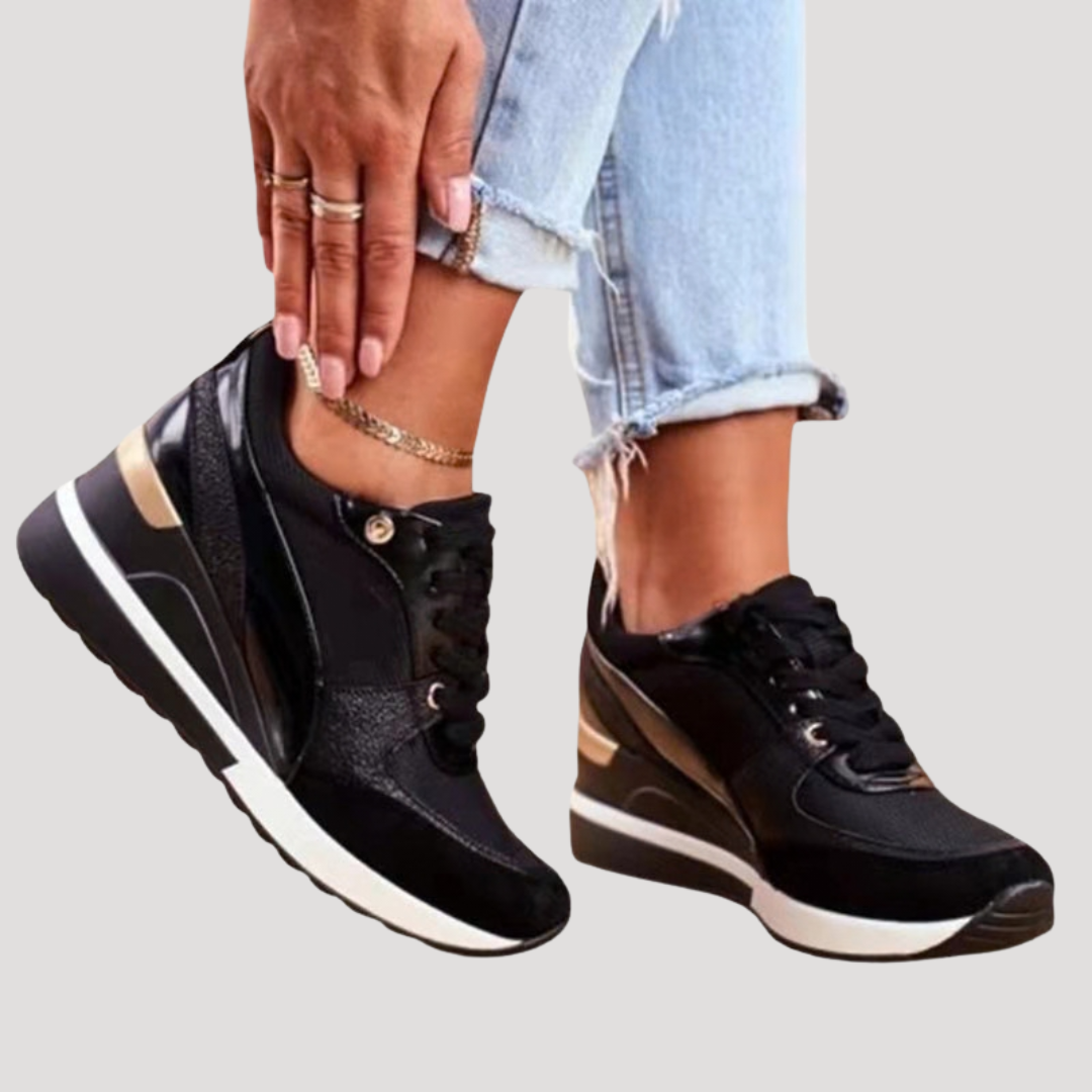 Wella Women’s Lace-Up Trainers featuring a stylish wedge platform design, perfect for casual outings and comfortable all-day wear. 1