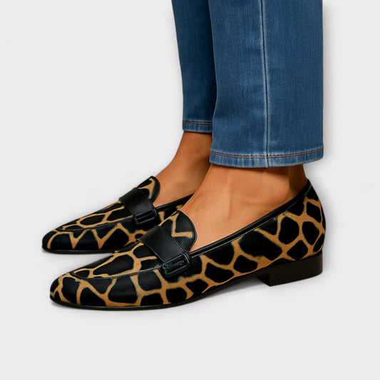 Wenna Women’s Classic Loafer featuring a stylish leopard-print design and elegant strap detail, perfect for fashionable and comfortable everyday wear. 0