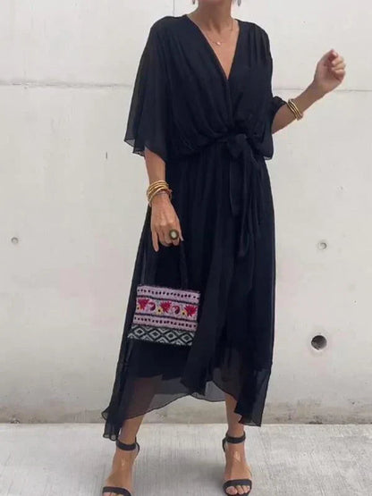 Whimsy Women's Maxi Dress featuring a stylish V-neck and a flowing silhouette, perfect for casual outings and special occasions. 1
