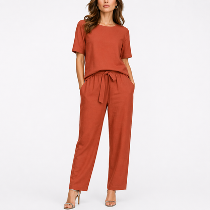 Willa Women's Two Piece Set featuring a stylish short-sleeve top and adjustable waist trousers, perfect for casual outings and comfortable wear. 2