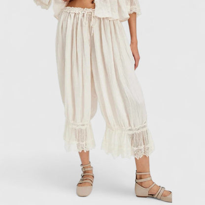 Winona Women’s Trousers featuring a stylish patchwork lace design and a comfortable relaxed fit, perfect for casual and chic outfits. 0