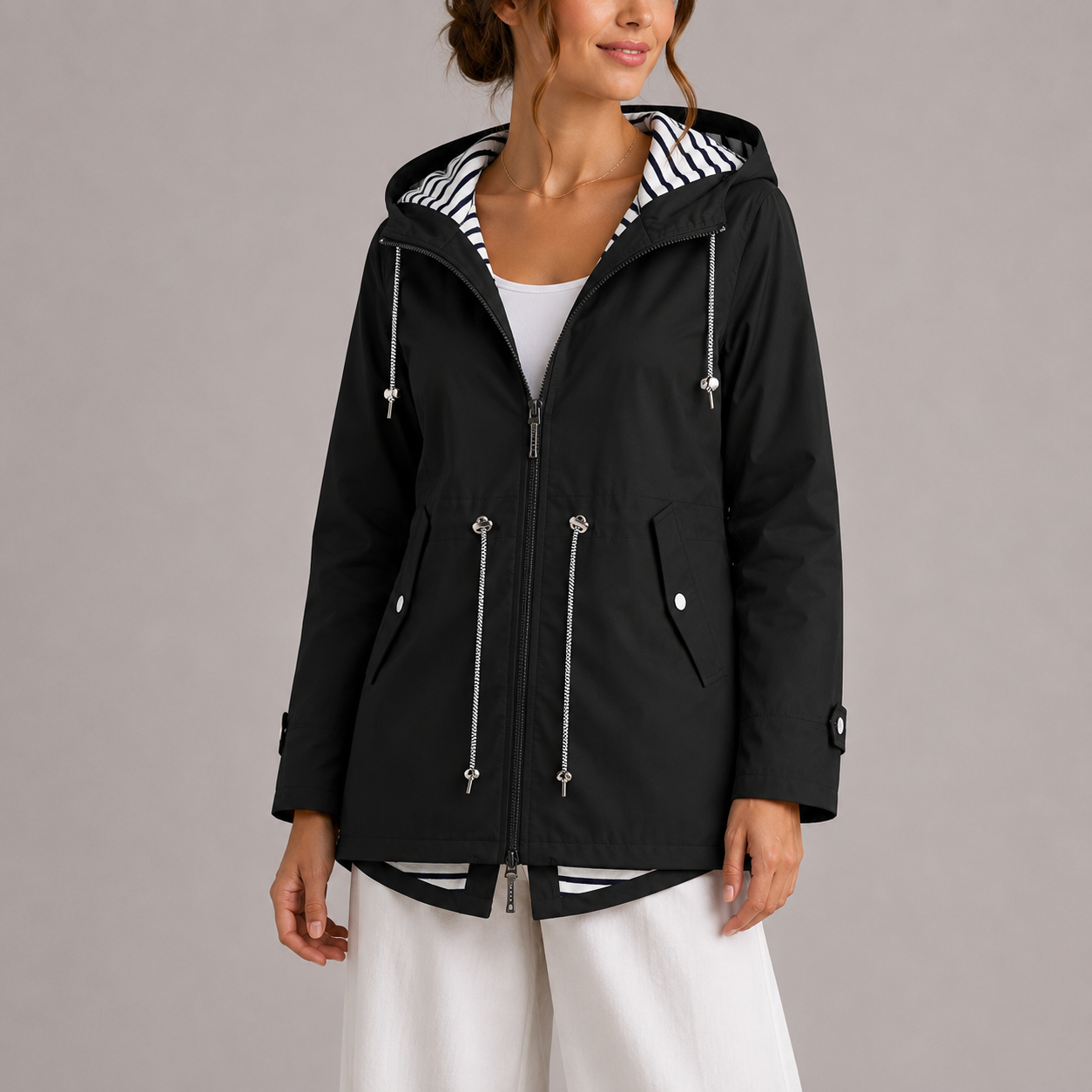 Wren Women's Waterproof Jacket featuring premium fabric for breathability and comfort, ideal for outdoor activities in all weather conditions. 2