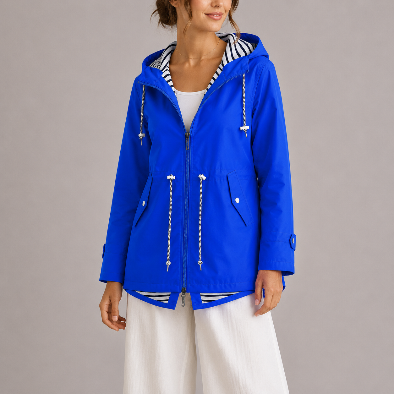 Wren Women's Waterproof Jacket featuring premium fabric for breathability and comfort, ideal for outdoor activities in all weather conditions. 4