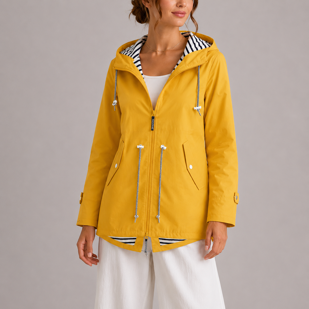 Wren Women's Waterproof Jacket featuring premium fabric for breathability and comfort, ideal for outdoor activities in all weather conditions. 5