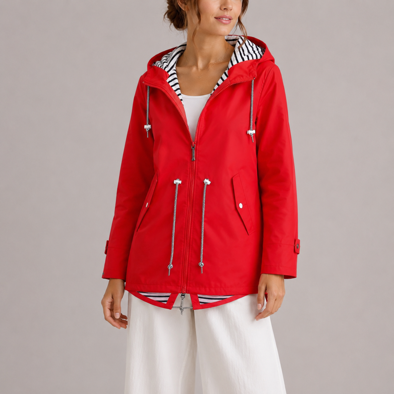 Wren Women's Waterproof Jacket featuring premium fabric for breathability and comfort, ideal for outdoor activities in all weather conditions. 6