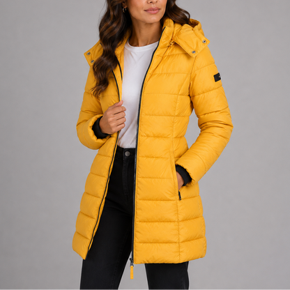 Wynna Women's Long Hooded Puffer Jacket featuring a stylish insulated quilted design, perfect for winter warmth and comfort. 3