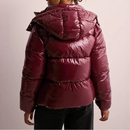 Wynna Women's Quilted Puffer Coat featuring lightweight insulation and a stylish hood, perfect for staying warm and fashionable during winter outings. 4
