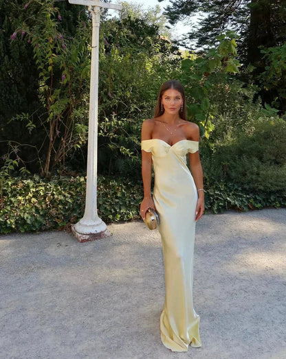 Yara Women’s Maxi Dress featuring an elegant off-the-shoulder design and a flowing silhouette, perfect for summer occasions and special events. 1